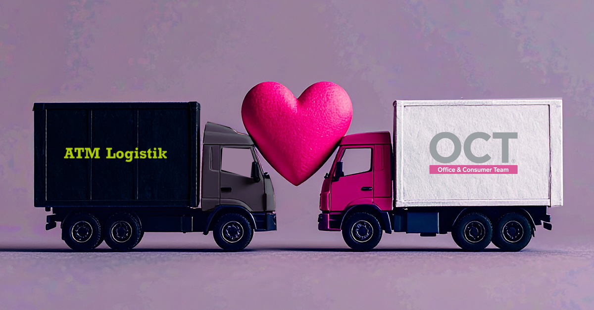Två lastbilar med logotyperna ATM Logistik och OCT står mittemot varandra med ett rosa hjärta mellan sig.